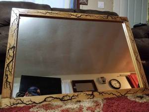 Electrocuted wood framed mirror