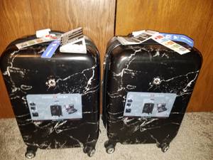 Pair of matching carry-on size suitcases (Waterloo)