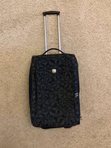 Expandable rolling suitcase from Wilson's leather