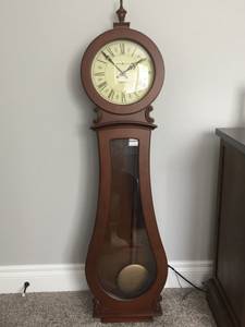 Beautiful chiming wood wall clock
