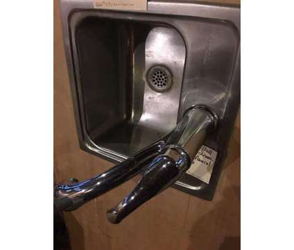Elkay sink w/ pfisher faucet on Butcher block counter top