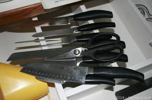 Kitchen items: knife set,sliverware,plates,glasses,cookware