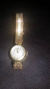 Woman's Gubelin 14k gold watch (Lilburn)