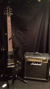Electric guitar and amplifier (East moline)