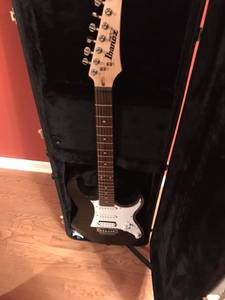 Ibanez electric guitar plus amplifier and hard case and stand (Hastings
