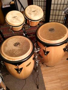 Congas, bongos with stands (Chicago)