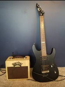 ESP LTD guitar and Honey Tone amp (Garden City)