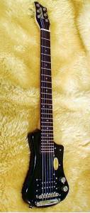Used, Hofner travel Guitar, almost new, $120.00