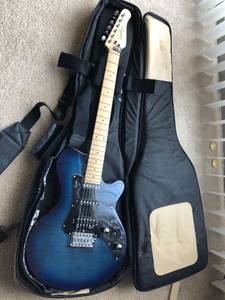 Godin Model SD electric guitar with amplifier