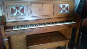 Wonderful Player Piano with matching Bench and music rolls (St. Augustine)