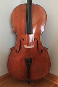 A Brand New full size cello with a bow and case.
