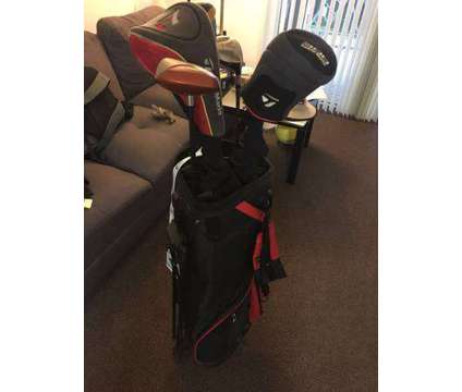 Golf bag, driver, fairway wood, balls