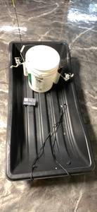 Ice fishing sled with bucket and two poles $75 (Macomb)