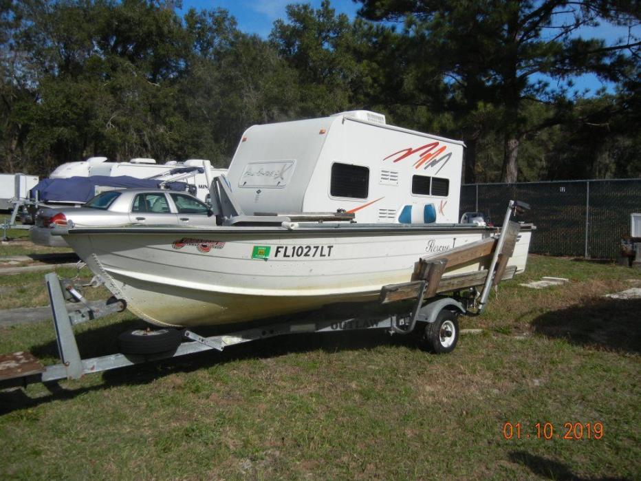 14' Starcraft boat, motor and trailer