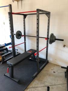 Bench, Squat Rack, and Olympic Weight Set