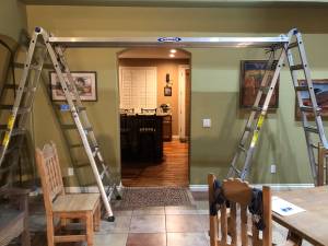 Two 20 ft. Werner folding ladders and 10 ft. aluminum plank (NW)