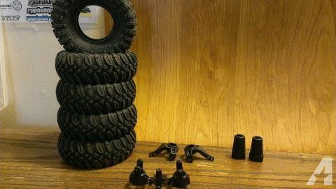 assorted Axial AX and SCX 10 RC parts