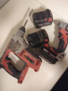 Milwaukee hammer drill and drill with 3 batteries 3 total (Derry)