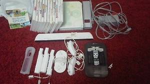 Wii console Fit and games bundle (Milton/south hero)