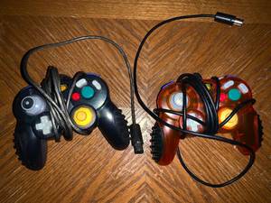 Two Nintendo Gamecube, Switch Controllers, Mad Catz Black