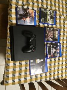 PS4 w/ 5 Games and Stand (Pascagoula)