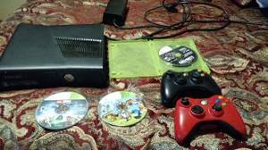X box 360 2 controllers and games (Beloit)