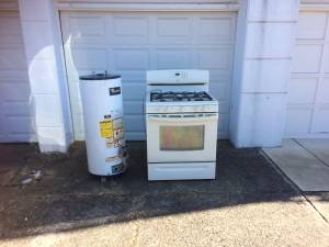 Free scrap stove and water heater (Back alley 7218 Battersby street)
